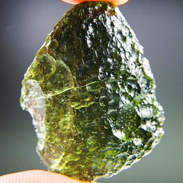 Certified Moldavite with natural breaks