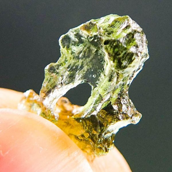 Moldavite with natural hole