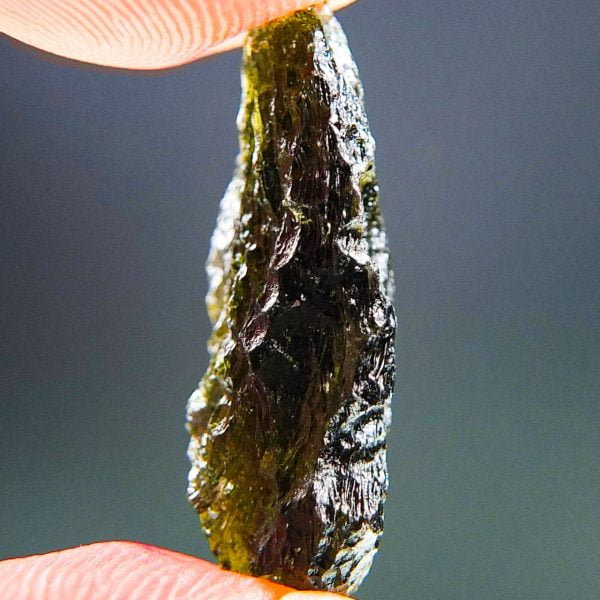 Moldavite - Glossy with brown green color