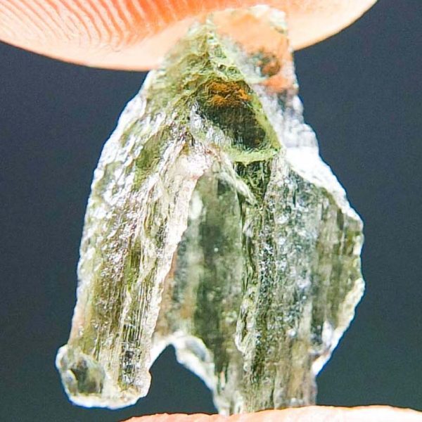 Moldavite with open bubble