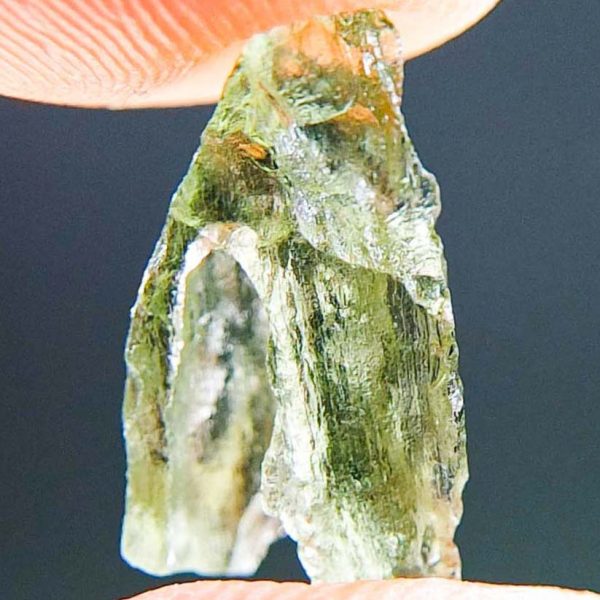 Moldavite with open bubble
