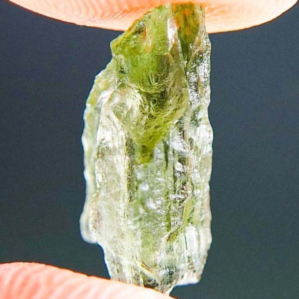 Moldavite with open bubble