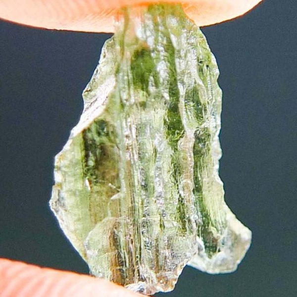 Moldavite with open bubble