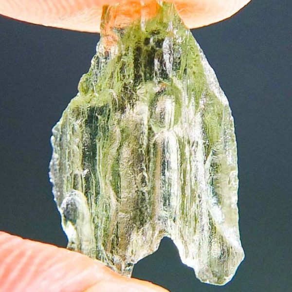Moldavite with open bubble