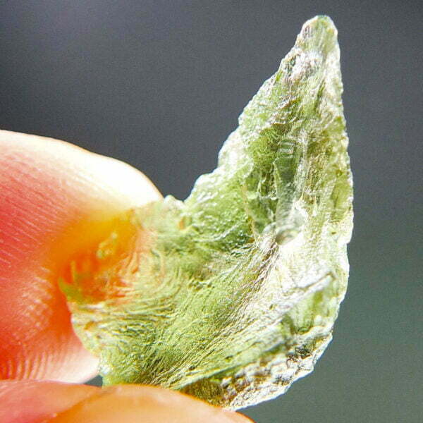 Rare Moldavite with natural hole and two kinds of sculpture