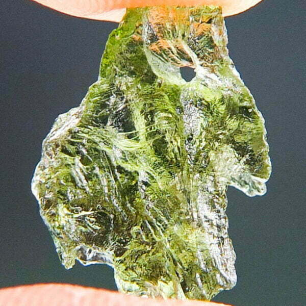 Vibrant green Moldavite with natural hole - quality A+