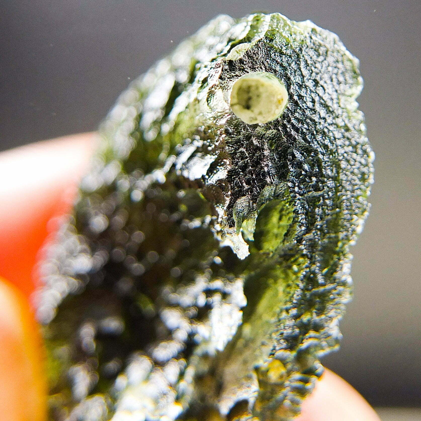 Rare Certified Moldavite - Elipsoid - natural fragment shape with long channel filled by clay