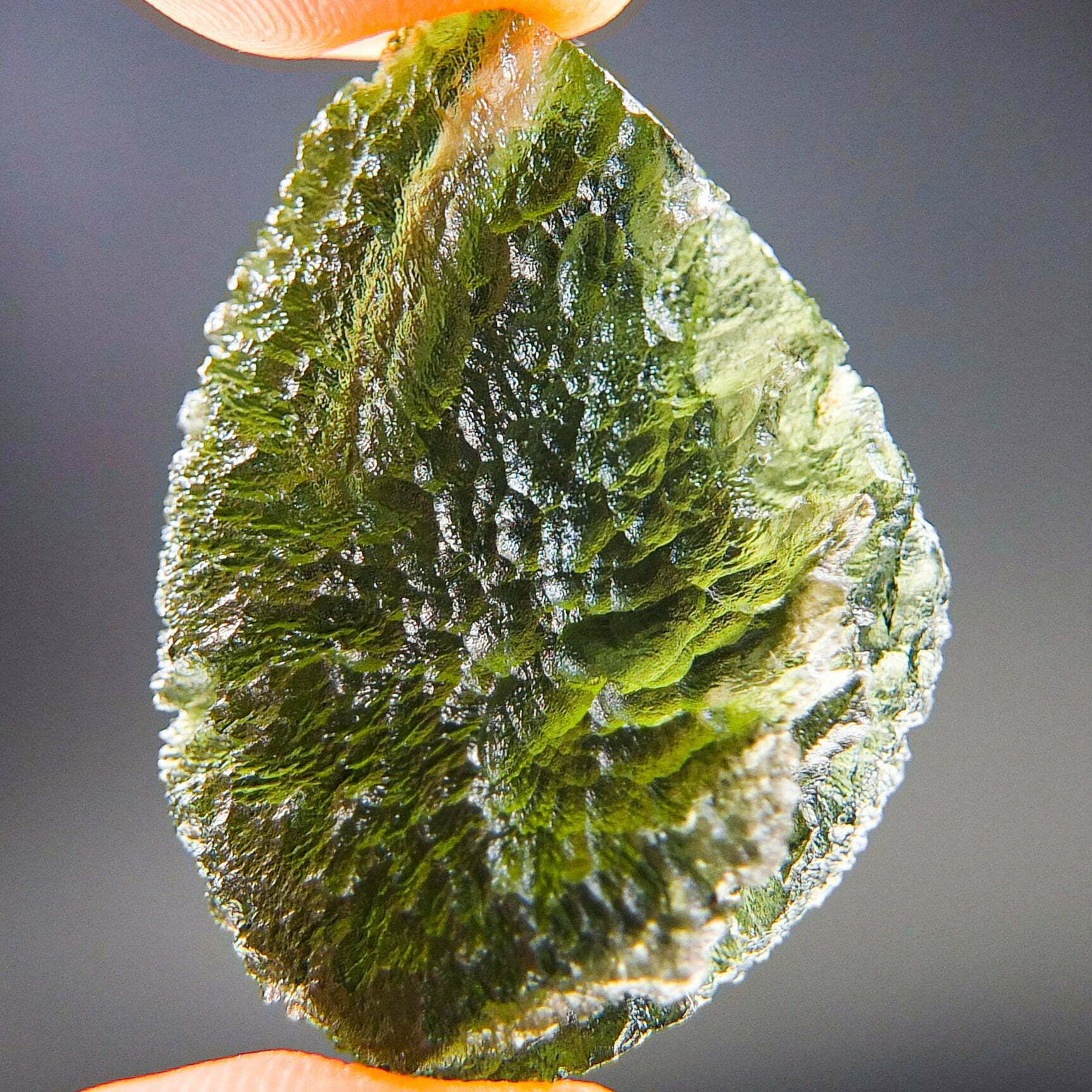 Rare Certified Moldavite - Elipsoid - natural fragment shape with long channel filled by clay