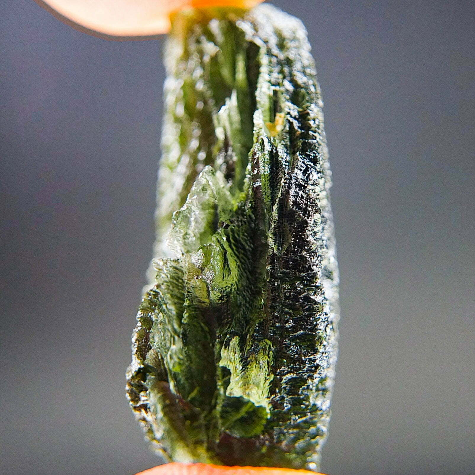 Rare Certified Moldavite - Elipsoid - natural fragment shape with long channel filled by clay