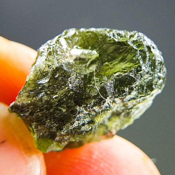 Moldavite with visible closed bubble - Certified