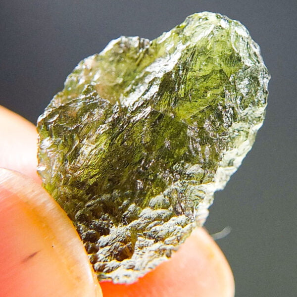 Moldavite with visible closed bubble - Certified
