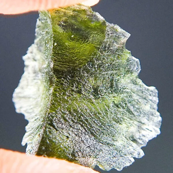 Moldavite with two kinds of sculpture