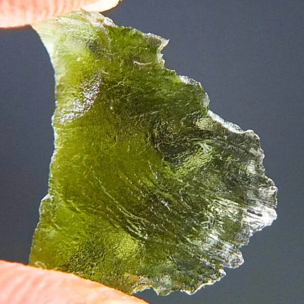 Moldavite with two kinds of sculpture