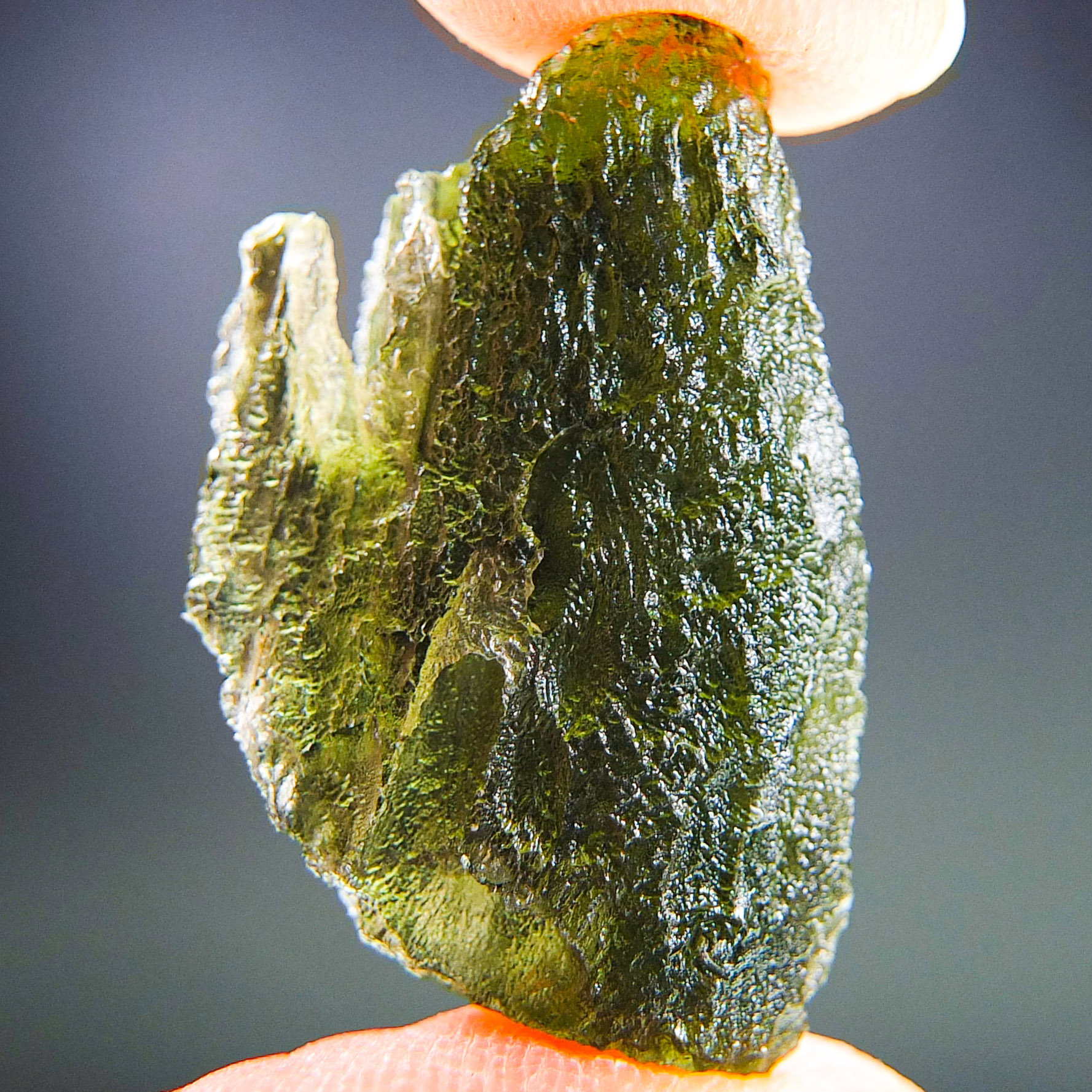 Moldavite with closed and open bubbles - Certified