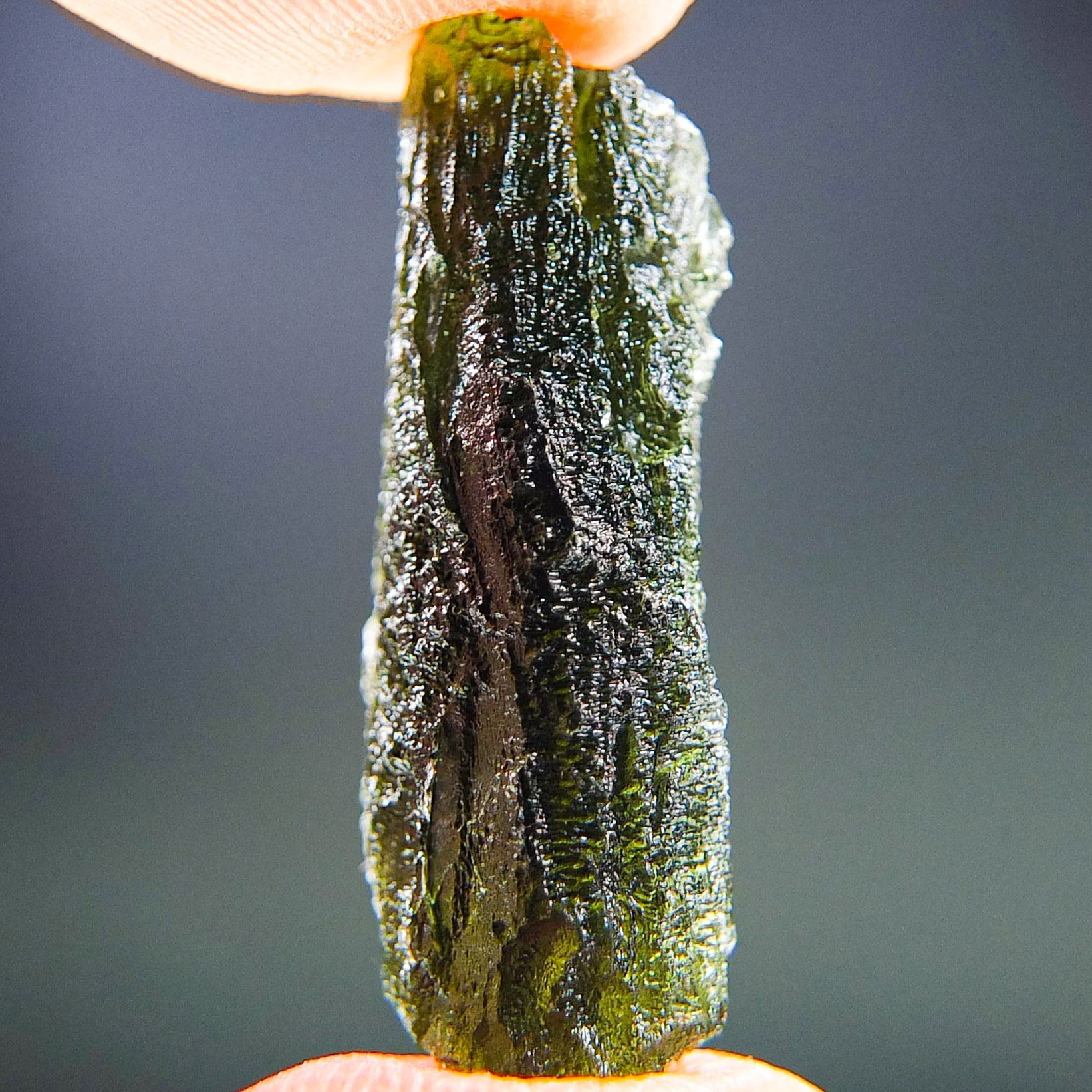 Moldavite with closed and open bubbles - Certified