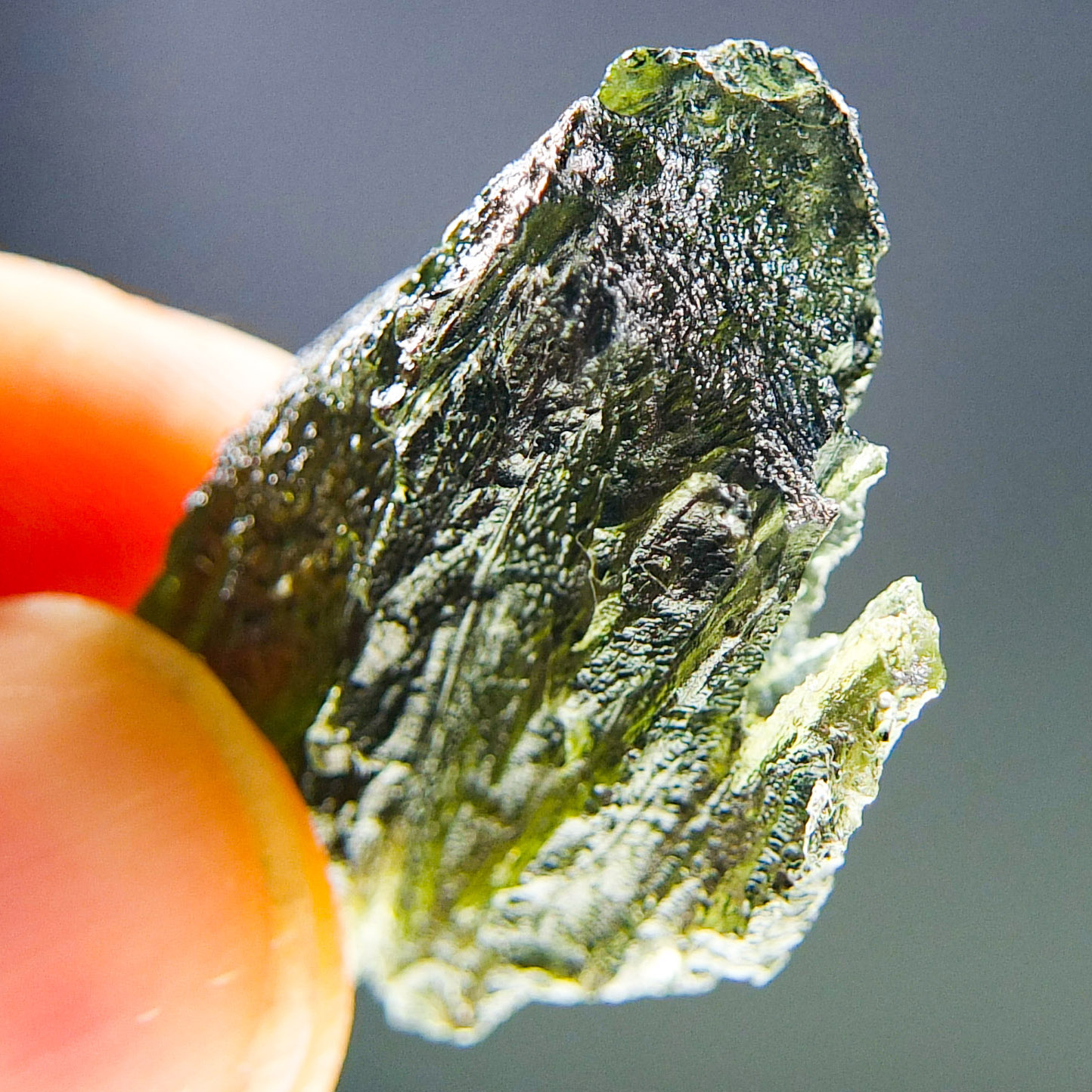 Moldavite with closed and open bubbles - Certified