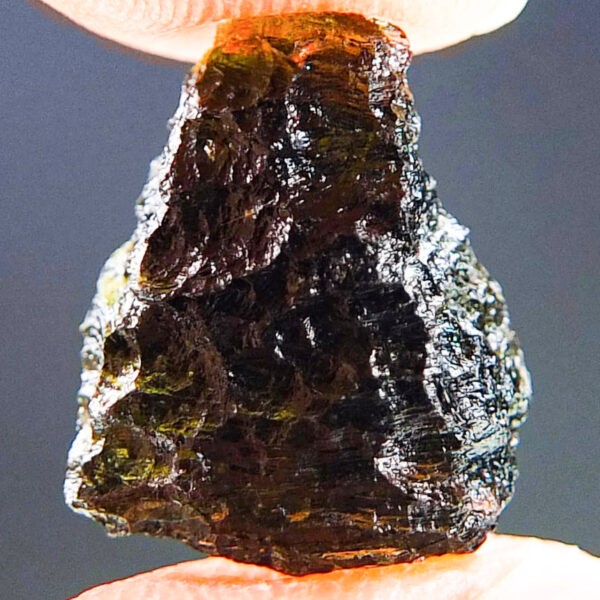 Moldavite with brown green color