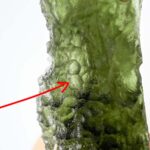 Moldavite with visible big closed bubble